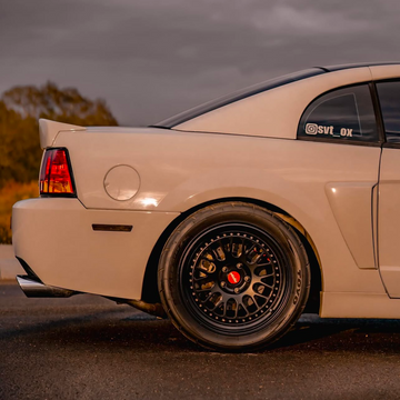 Whistler SK1 Satin Black Face Gloss Black Lip wheels on a car